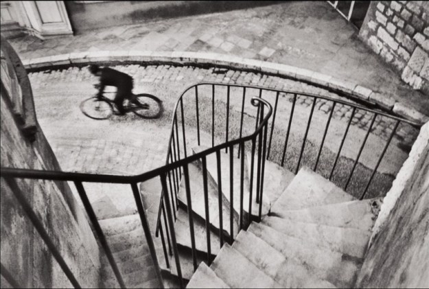 Henri Cartier-Bresson's Man Cycling Down the Street, 1932